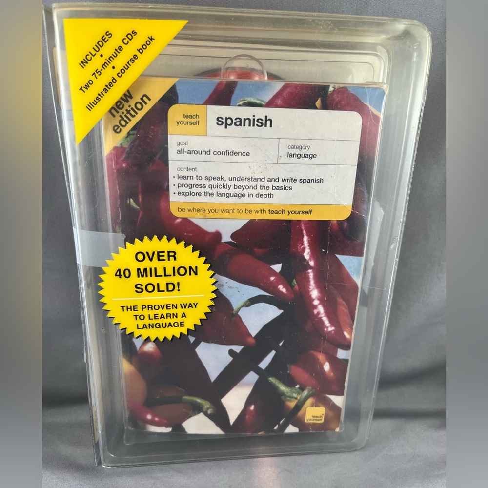 Teach yourself Spanish book &  two 75 minute cds.Learn to speak & write Spanish.